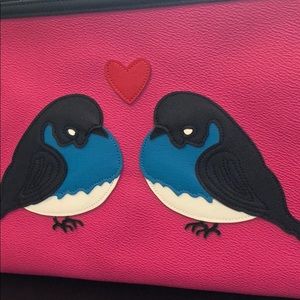 C. Wonder- Lovebird clutch 🐦